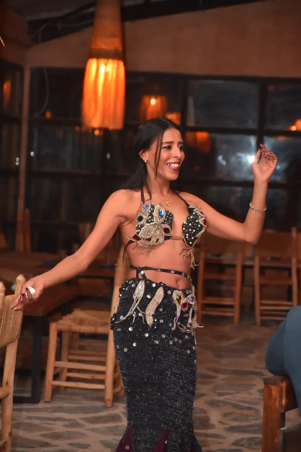 A dancer performing at an evening dinner show