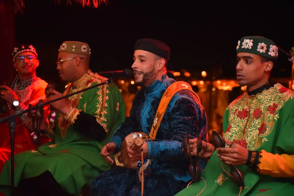 Gnaoua musicians performing at night