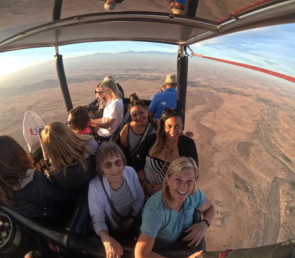 Guests in the balloon basket above the plain