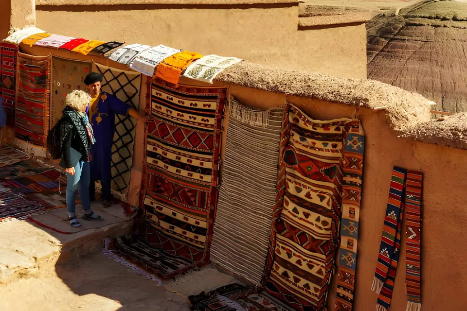 Rugs laid out on a rooftop terrace